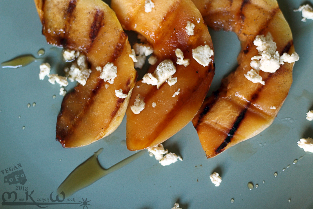 Grilled Cardamom Cantaloupe with Swiss Cheese Crumbles